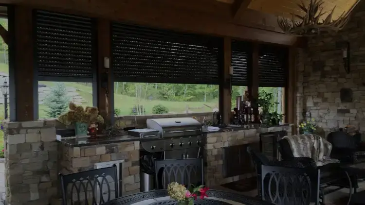 retractable security shutters on outdoor kitchen